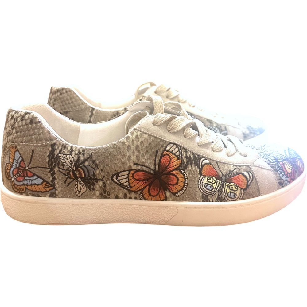 Johnny was size ten tennis shoes butterfly design